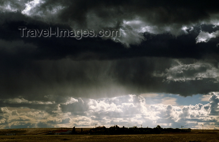 chile254: Magallanes region, Chile: storm clouds over an estancia on the pampas of Patagonia – estancias are extensive agricultural properties dedicated to cattle or sheep grazing – biological free range meat production - photo by C.Lovell - (c) Travel-Images.com - Stock Photography agency - Image Bank