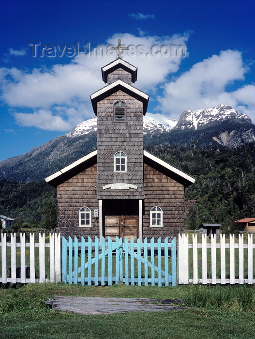 chile279: Aisén region, Chile: wooden church with white picket fence and blue gate on the camino austral – wooden shingles - Patagonia - photo by C.Lovell - (c) Travel-Images.com - Stock Photography agency - Image Bank