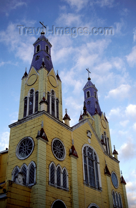 chile76: Castro, Chiloé island, Los Lagos Region, Chile: twin church steeples of San Francisco de Castro church built in 1906 – colourful wooden church by architect Eduardo Provasoli - Unesco world heritage site - Iglesia Apóstol Santiago - photo by C.Lovell - (c) Travel-Images.com - Stock Photography agency - Image Bank