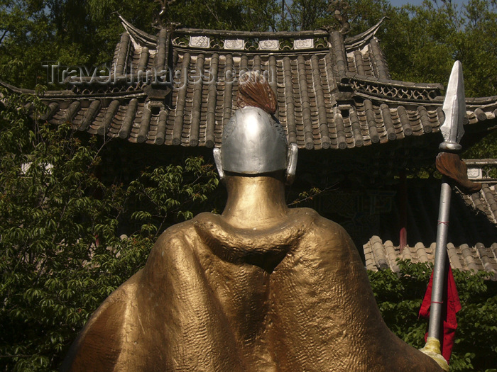 china234: Lijiang, Yunnan Province, China: Dragon Park - golden warrior and traditional roof - photo by M.Samper - (c) Travel-Images.com - Stock Photography agency - Image Bank