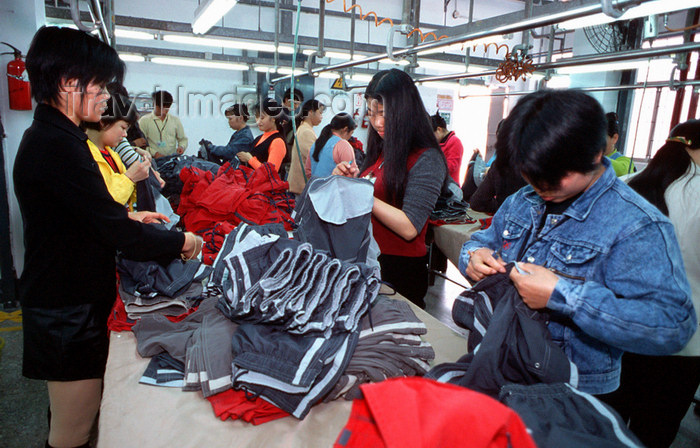 china242: Dongguan, Guangdong province, China: seamstress - Chinese factory workers - photo by B.Henry - (c) Travel-Images.com - Stock Photography agency - Image Bank