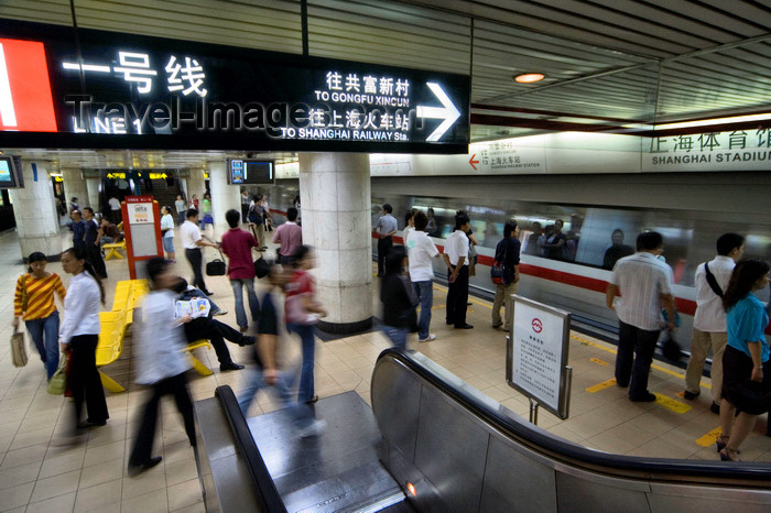 china272: Shanghai, China: subway - Stadium station - escalator and train arriving - photo by Y.Xu - (c) Travel-Images.com - Stock Photography agency - Image Bank