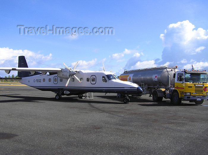 cocos-islands10: Cocos islands / Keeling islands / XKK - West Island: refuelling a Dornier 228  - aircraft - airliner - Cocos Islands International Airport - Shell fuel truck- photo by Air West Coast - (c) Travel-Images.com - Stock Photography agency - Image Bank