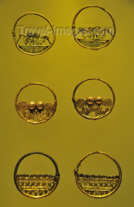 colombia168: Bogotá, Colombia: Gold Museum - Museo del Oro - tumbaga earrings - Zenú filigree work - dignitaries and amphibian men - photo by M.Torres - (c) Travel-Images.com - Stock Photography agency - Image Bank