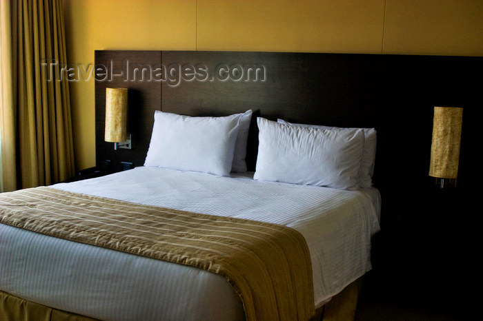 colombia19: Medellín, Colombia: a comfortable hotel bed awaiting a guest's rest - photo by E.Estrada - (c) Travel-Images.com - Stock Photography agency - Image Bank