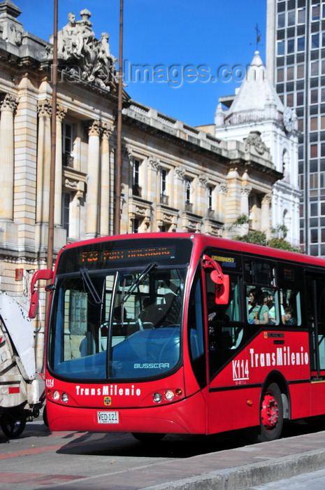 colombia92: Bogotá, Colombia: Transmilenio bus rapid transit system - bus on Avenida Jiménez de Quesada, in front of San Francisco Palace, Antigua Gobernación de Cundinamarca - Veracruz - Santa Fe - photo by M.Torres - (c) Travel-Images.com - Stock Photography agency - Image Bank