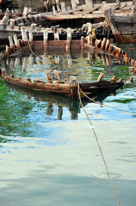 comoros57: Moroni, Grande Comore / Ngazidja, Comoros islands: remains of wooden boats at the dhow port- Port aux Boutres - photo by M.Torres - (c) Travel-Images.com - Stock Photography agency - Image Bank