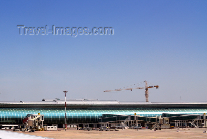 congo12: Brazzaville, Congo: Maya-Maya Airport (IATA: BZV, ICAO: FCBB), Brazzaville international airport - air side of the Chinese built terminal - curved glass facade - photo by M.Torres - (c) Travel-Images.com - Stock Photography agency - Image Bank