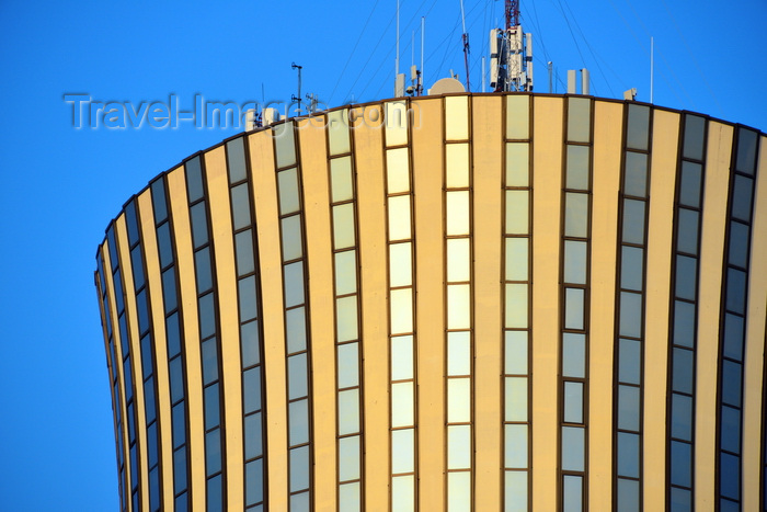 congo34: Brazzaville, Congo: top floors of the Nabemba tower / Tour Nabemba, aka Elf Tower, built by Elf Aquitaine Congo, houses the offices of Total - skyscraper by architect Jean Marie Legrand - seen against blue sky - Poto-Poto - photo by M.Torres - (c) Travel-Images.com - Stock Photography agency - Image Bank