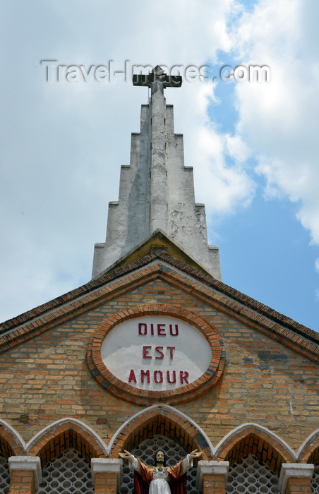 congo4: Brazzaville, Congo: Cathedral of the Sacred Heart façade detail - blind arcade, spire and circle with the inscription 'God is love' -  Cathédrale du Sacré Cœur / Cathédrale Saint Firmin (1892) - designed by Monseigneur Augouard - Quartier de l'Aiglon - photo by M.Torres - (c) Travel-Images.com - Stock Photography agency - Image Bank