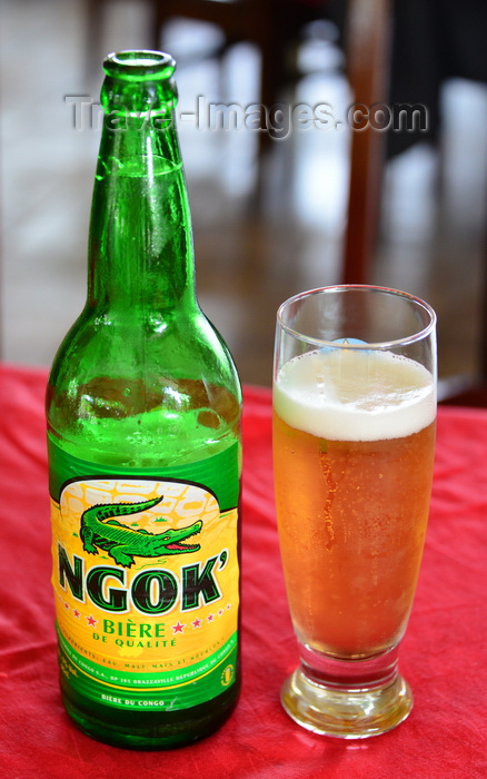 congo42: Brazzaville, Congo: Ngok' beer - bottle and glass of the famous Congolese brew - photo by M.Torres - (c) Travel-Images.com - Stock Photography agency - Image Bank