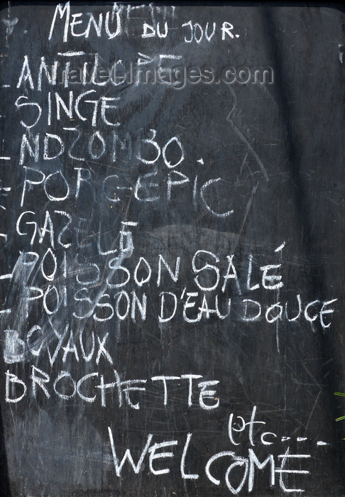 congo53: Brazzaville, Congo: wildlife for lunch - bush meat advertised in a blackboard outside a restaurant - among other specialities you can have antelope, monkey, gazelle, porcupine, lungfish (ndzombo) ... - photo by M.Torres - (c) Travel-Images.com - Stock Photography agency - Image Bank