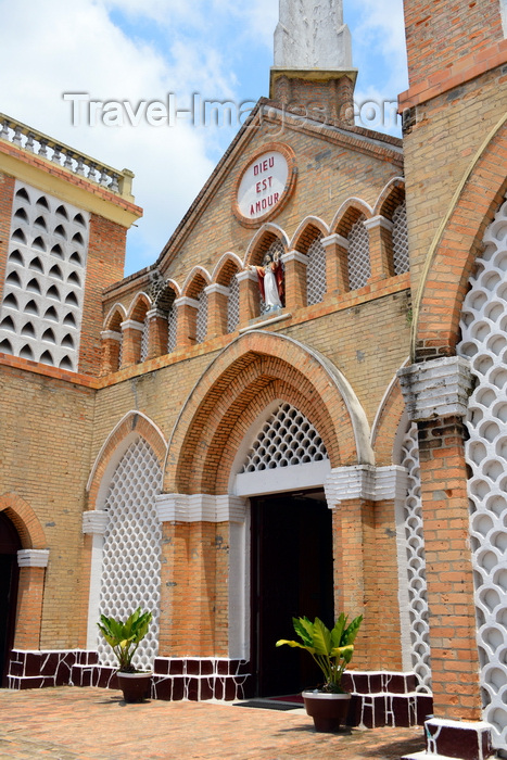 congo6: Brazzaville, Congo: main gate of the Cathedral of the Sacred Heart, with plant pots - blind arcade with Jesus - Cathédrale du Sacré Cœur / Cathédrale Saint Firmin (1892) - designed by Monseigneur Augouard - Quartier de l'Aiglon - photo by M.Torres - (c) Travel-Images.com - Stock Photography agency - Image Bank