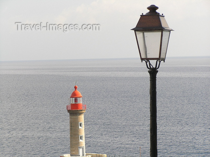 corsica171: Corsica - Bastia: lighthouse and lamppost - photo by J.Kaman - (c) Travel-Images.com - Stock Photography agency - Image Bank