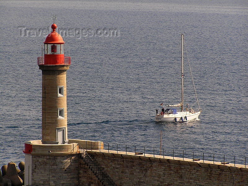 corsica172: Corsica - Bastia: lighthouse and boat leaving port - photo by J.Kaman - (c) Travel-Images.com - Stock Photography agency - Image Bank