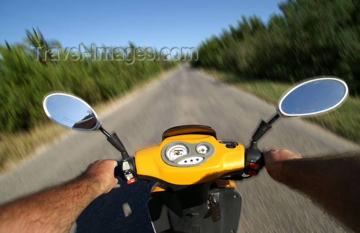 cuba57: Cuba - Guardalavaca - yellow scooter - the open road - photo by G.Friedman - (c) Travel-Images.com - Stock Photography agency - Image Bank