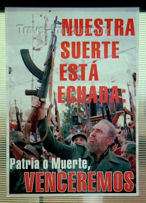 cuba77: Cuba - Holguín - political poster - Fidel with AK-77 - 'Fatherland or Death - We shall win' - photo by G.Friedman - (c) Travel-Images.com - Stock Photography agency - Image Bank