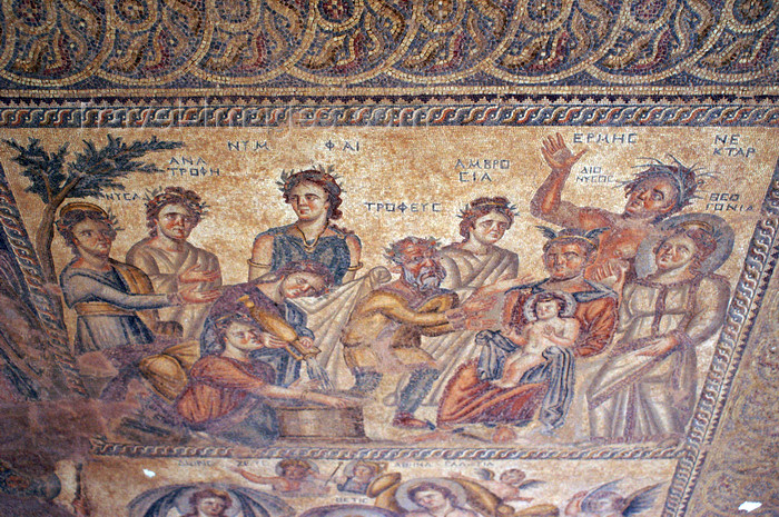 cyprus98: Paphos, Cyprus: Roman mosaic -  the god Dionysus as the "divine child" with a halo about his head being presented by Hermes - house of Aion - photo by A.Ferrari - (c) Travel-Images.com - Stock Photography agency - Image Bank