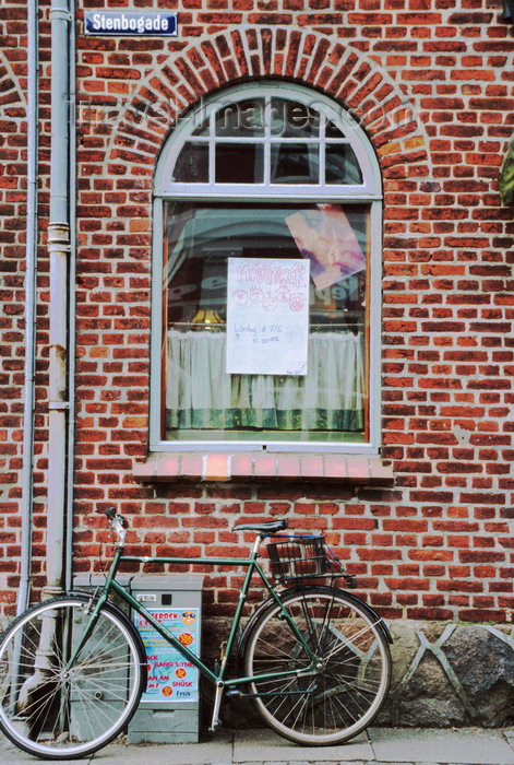 denmark38: Ribe, southwest Jutland, Denmark: Stenbogade - bicycle parked by a brick wall - photo by K.Gapys - (c) Travel-Images.com - Stock Photography agency - Image Bank