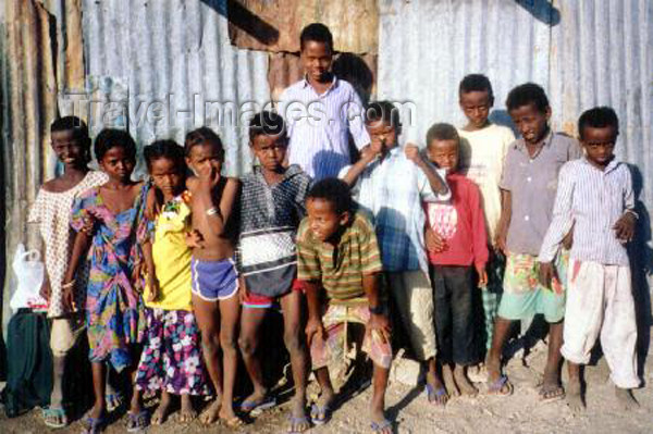 djibouti3: Yoboki - Dikhil province, Djibouti: Afar children stare at the white men - credits: photo © by B.Cloutier - (c) Travel-Images.com - Stock Photography agency - Image Bank