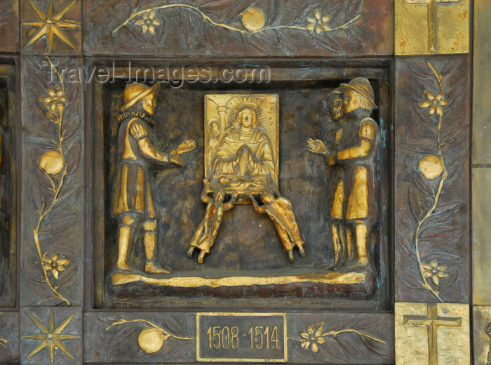 dominican109: Higüey, Dominican Republic: La Altagracia - the Virgin before the Sabana Battle - detail of the bronze gate of the Basilica of Our Lady - Basilica de Nuestra Señora de la Altagracia - alto relieve en bronce - photo by M.Torres - (c) Travel-Images.com - Stock Photography agency - Image Bank