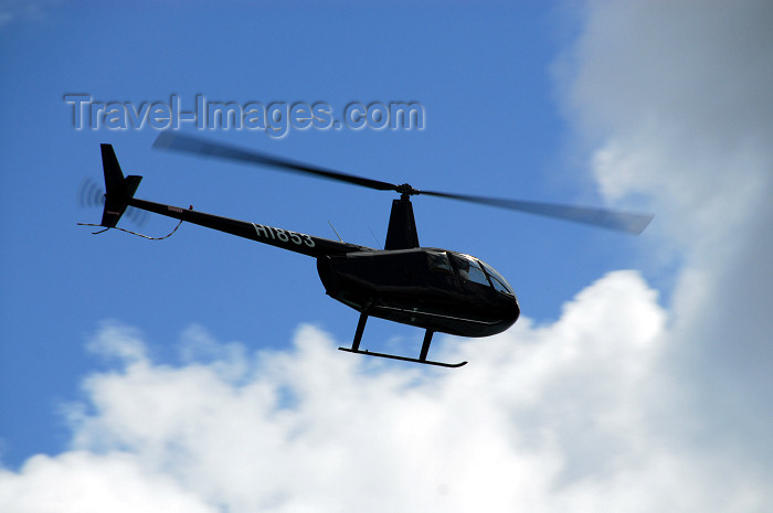 dominican152: Punta Cana, Dominican Republic:  Raven II Raven helicopter over Arena Gorda Beach - HI853 - photo by M.Torres - (c) Travel-Images.com - Stock Photography agency - Image Bank