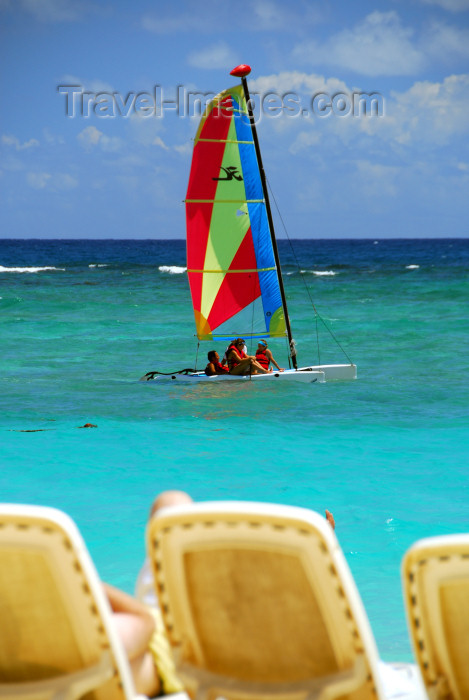 dominican159: Punta Cana, Dominican Republic: small catamaran - the chaise longue perspective -  Arena Gorda Beach - photo by M.Torres - (c) Travel-Images.com - Stock Photography agency - Image Bank