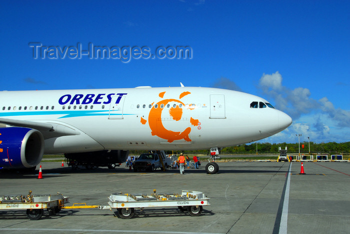 dominican188: Punta Cana, Dominican Republic: Orbest Airbus A330-200 CS-TRA - front - Punta Cana International Airport - PUJ / MDPC - photo by M.Torres - (c) Travel-Images.com - Stock Photography agency - Image Bank