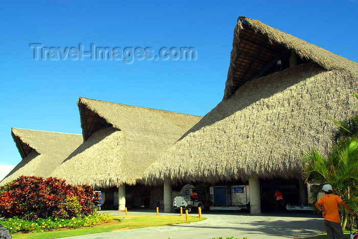 dominican191: Punta Cana, Dominican Republic: thatched roofs of terminal - air side - Punta Cana International Airport - PUJ / MDPC - photo by M.Torres - (c) Travel-Images.com - Stock Photography agency - Image Bank