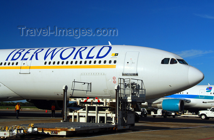 dominican217: Punta Cana, Dominican Republic: Iberworld Airbus A330-322 EC-IJH and Ground Support Equipment - Punta Cana International Airport - PUJ / MDPC - photo by M.Torres - (c) Travel-Images.com - Stock Photography agency - Image Bank