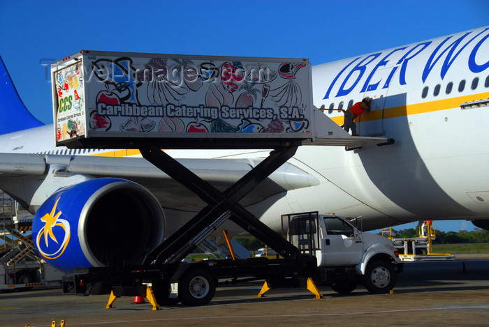 dominican219: Punta Cana, Dominican Republic: Iberworld Airbus A330-322 EC-IJH - catering vehicle lifting its cargo - Caribbean Catering Services - Punta Cana International Airport - PUJ / MDPC - photo by M.Torres - (c) Travel-Images.com - Stock Photography agency - Image Bank