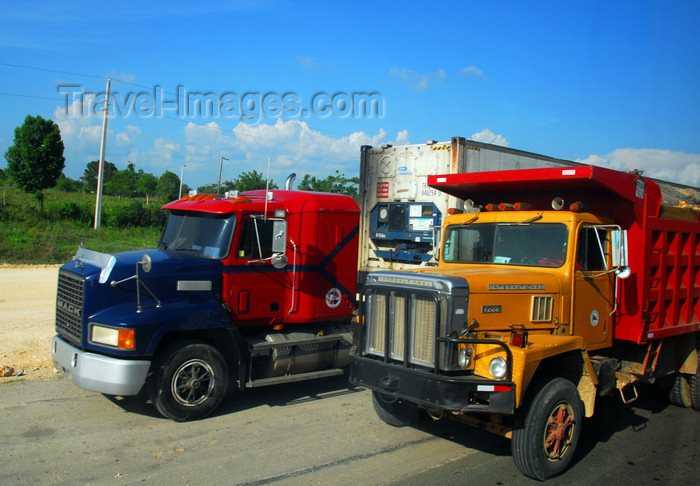 dominican227: La Romana, Dominican Republic: American trucks head to San Domingo - Mack and International - photo by M.Torres - (c) Travel-Images.com - Stock Photography agency - Image Bank