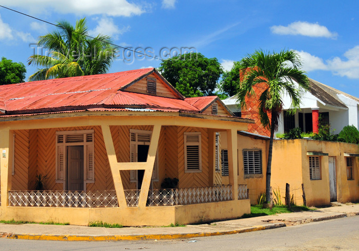 dominican248: Dajabón, Dominican Republic: street corner - lively colors of Creole architecture - Cibao region - photo by M.Torres - (c) Travel-Images.com - Stock Photography agency - Image Bank