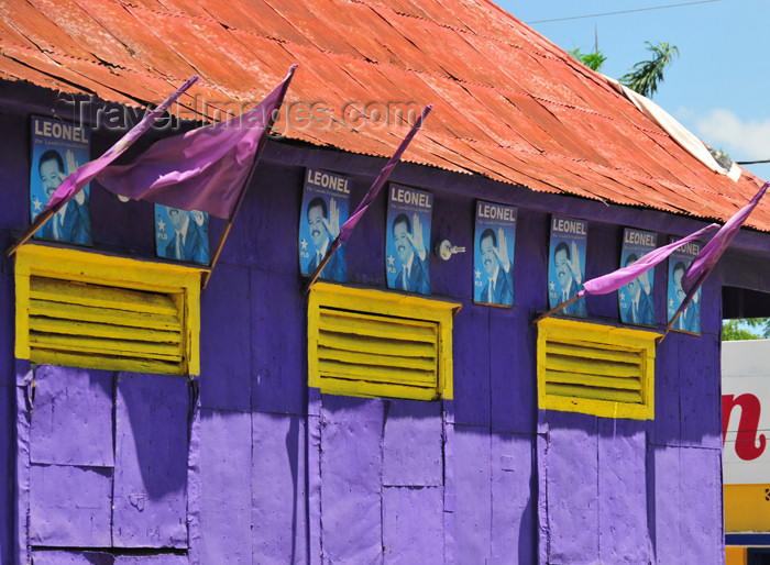 dominican250: Dajabón, Dominican Republic: campaigning for the presidential election - posters on a blue wall - photo by M.Torres - (c) Travel-Images.com - Stock Photography agency - Image Bank