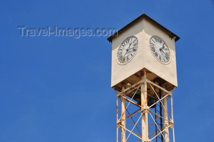 dominican256: Monte Cristi, Dominican Republic: Public clock, facing the four cardinal directions - Plaza Duarte - photo by M.Torres - (c) Travel-Images.com - Stock Photography agency - Image Bank