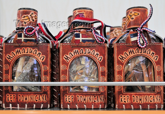 dominican278: El Catey, Samaná province, Dominican republic: Mamajuana - drink made with rum, wine, honey, tree bark and herbs - famous as a local aphrodisiac - Samaná El Catey International Airport - photo by M.Torres - (c) Travel-Images.com - Stock Photography agency - Image Bank