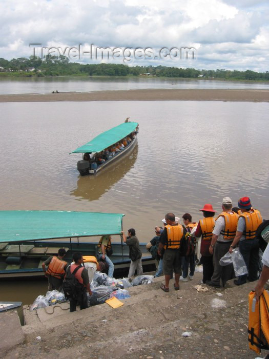 ecuador16: Ecuadorian Amazonia: tourists in lifejackets board their boat - Pastaza River (photo by Rod Eime) - (c) Travel-Images.com - Stock Photography agency - Image Bank