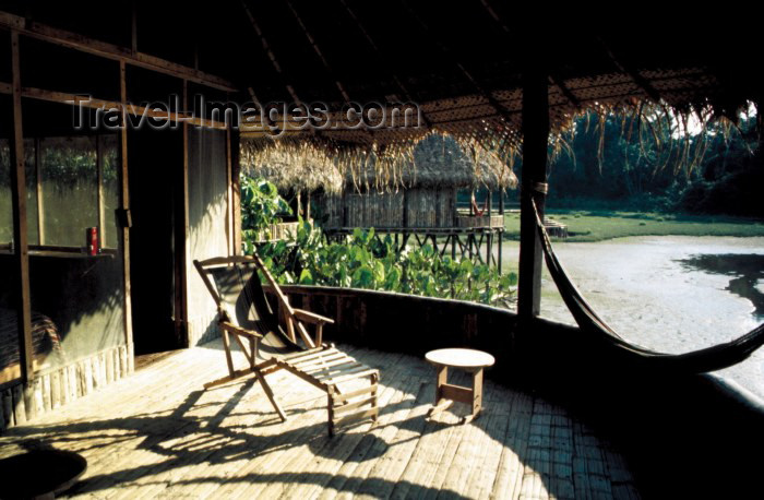 ecuador22: Ecuadorian Amazonia: Kapawi camp - verandah with hammock - Ecolodge and Reserve (photo by Rod Eime) - (c) Travel-Images.com - Stock Photography agency - Image Bank