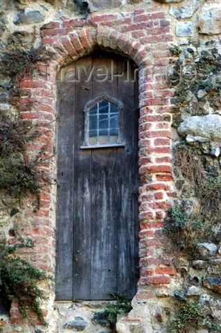 england109: Suffolk: an old castle door stands the test of time - photo by F.Hoskin - (c) Travel-Images.com - Stock Photography agency - Image Bank