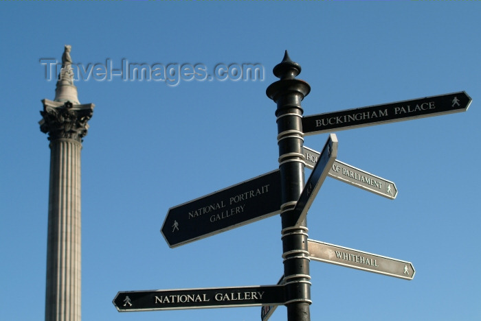 england221: London: Nelson's columns and sign post - Trafalgar square - photo by K.White - (c) Travel-Images.com - Stock Photography agency - Image Bank