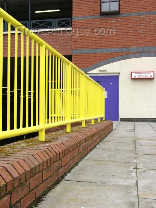 england305: UK - England - Ellesmere Port: yellow railings and purple door, Cheshire Oaks Designer Outlet Centre - photo by D.Jackson - (c) Travel-Images.com - Stock Photography agency - Image Bank