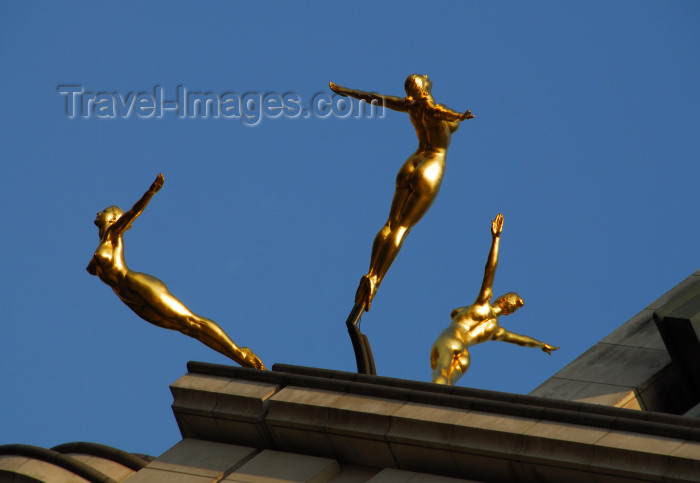 england459: London, England: gilded synchronised divers - sculpture 'Three Graces' by Rudy Weller - roof of the Criterion Building - Piccadilly Circus - photo by Miguel Torres - (c) Travel-Images.com - Stock Photography agency - Image Bank