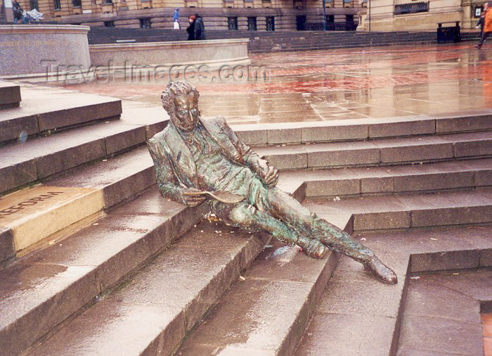 england5: Birmingham, West Midlands, England: an economist resting - Thomas Attwood Statue by Sioban Coppinger and Fiona Peeve - Chamberlain square - stairs - photo by M.Torres - (c) Travel-Images.com - Stock Photography agency - Image Bank