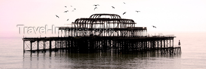 england525: Brighton, East Sussex, England, United Kingdom: silhouetted remains of the old burnt west Pier and seagulls - designed by  Eugenius Birch - photo by B.Henry - (c) Travel-Images.com - Stock Photography agency - Image Bank