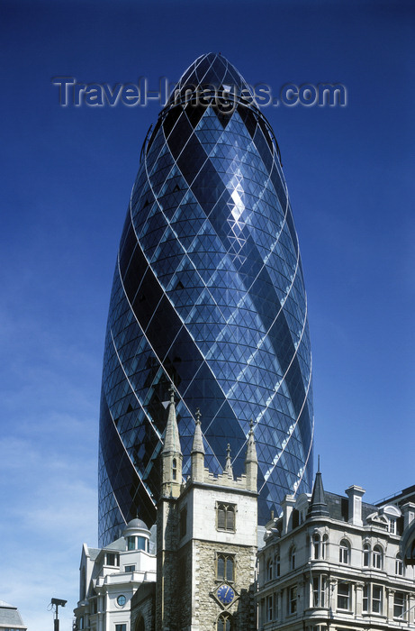 england774: London, England: Swiss RE building, the Gherkin - 30 St Mary Axe - built by Skanska - St Andrew Undershaft Church at the bottom - photo by A.Bartel - (c) Travel-Images.com - Stock Photography agency - Image Bank