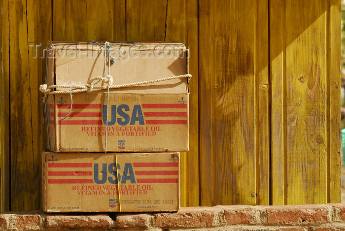 eritrea86: Eritrea - Mendefera, Southern region: cardboard boxes - food donations - vegetable oil from the US - vitamin A fortified - photo by E.Petitalot - (c) Travel-Images.com - Stock Photography agency - Image Bank