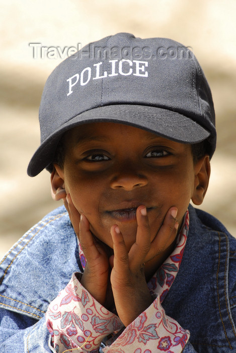 eritrea9: Eritrea - Asmara: smilling boy with a police cap - photo by E.Petitalot - (c) Travel-Images.com - Stock Photography agency - Image Bank