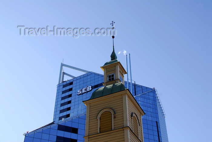 estonia195: Estonia, Tallinn: Old wooden church spire in front of new skyscraper - SEB - photo by J.Pemberton - (c) Travel-Images.com - Stock Photography agency - Image Bank