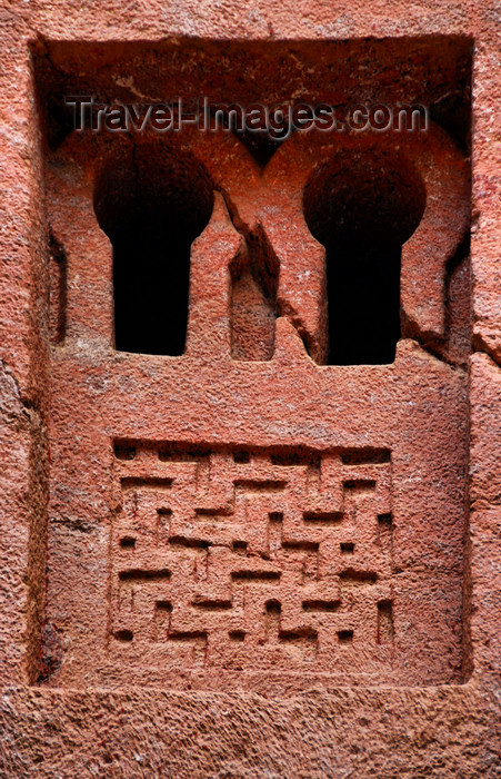 ethiopia156: Lalibela, Amhara region, Ethiopia: Bet Medhane Alem rock-hewn church - window with geometrical motives - photo by M.Torres - (c) Travel-Images.com - Stock Photography agency - Image Bank