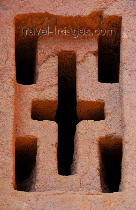 ethiopia159: Lalibela, Amhara region, Ethiopia: Bet Medhane Alem rock-hewn church - cruciform window - photo by M.Torres - (c) Travel-Images.com - Stock Photography agency - Image Bank